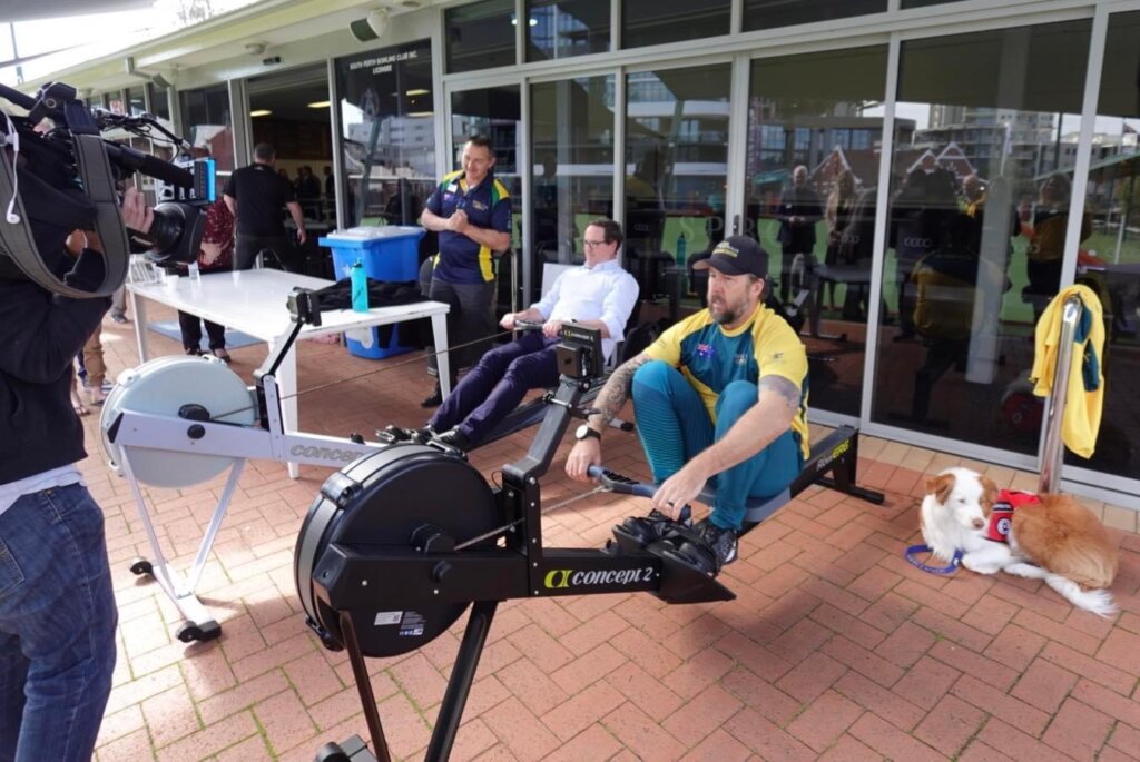 Invictus Games 2023 competitor Adam Slot and Minister Keogh compete for the cameras at the WA Invictus Australia launch